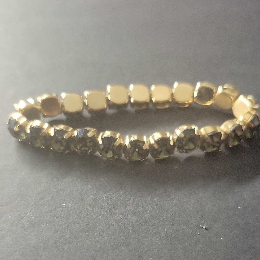 Elegant Gold and Black Bracelet